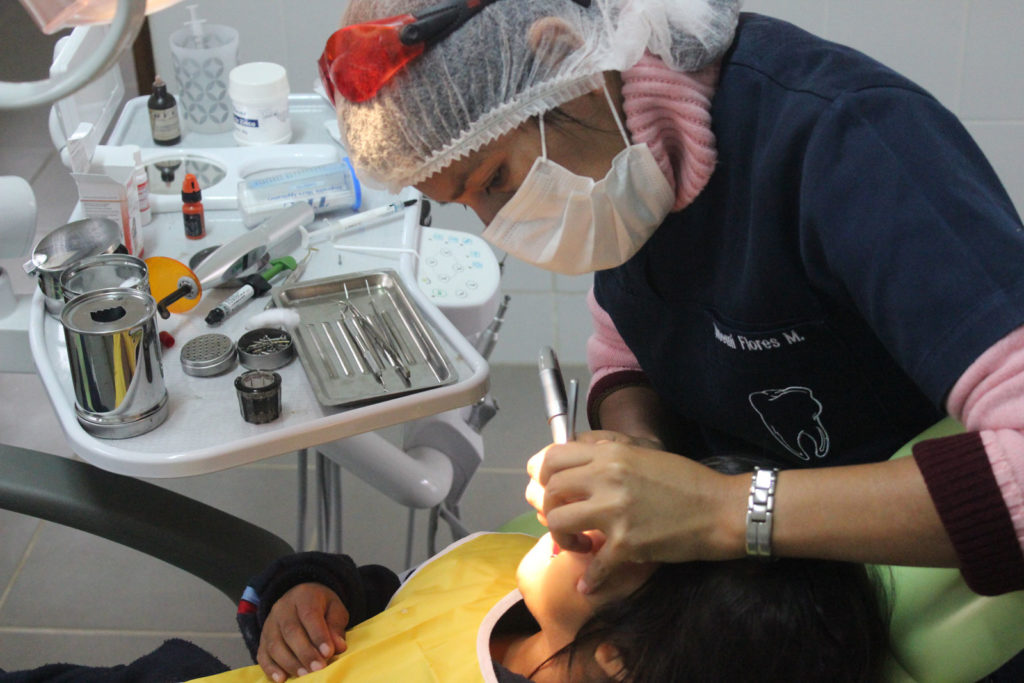 Child receiving dental care in NPH Bolivia