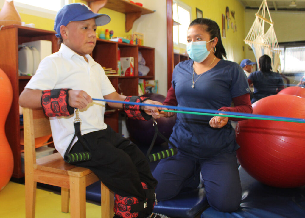 Emerson receiving therapy at NPH Guatemala